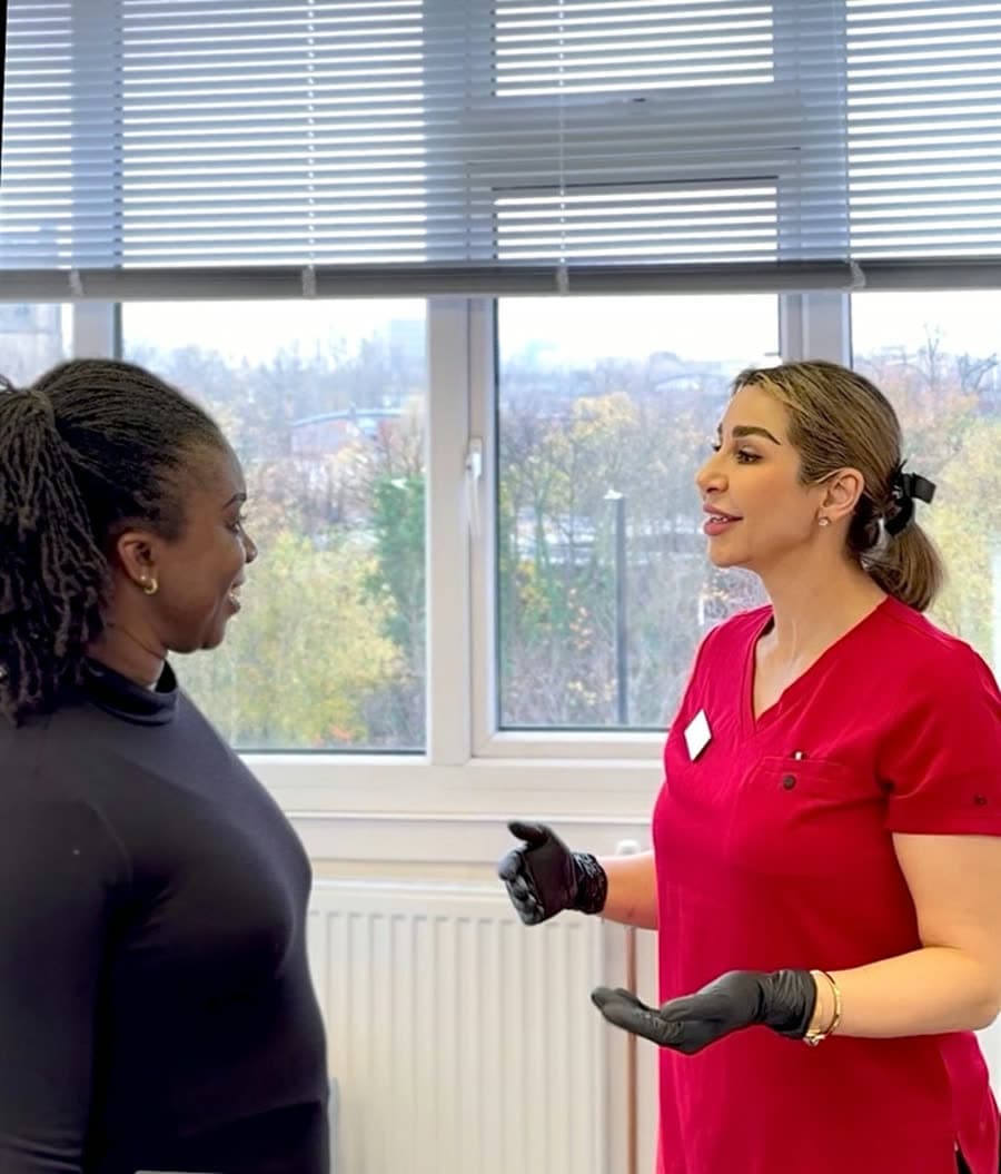 Mana, founder of Mana Semipermanent, talking through a treatment plan with a client at the studio in Jesmond, Newcastle upon Tyne.