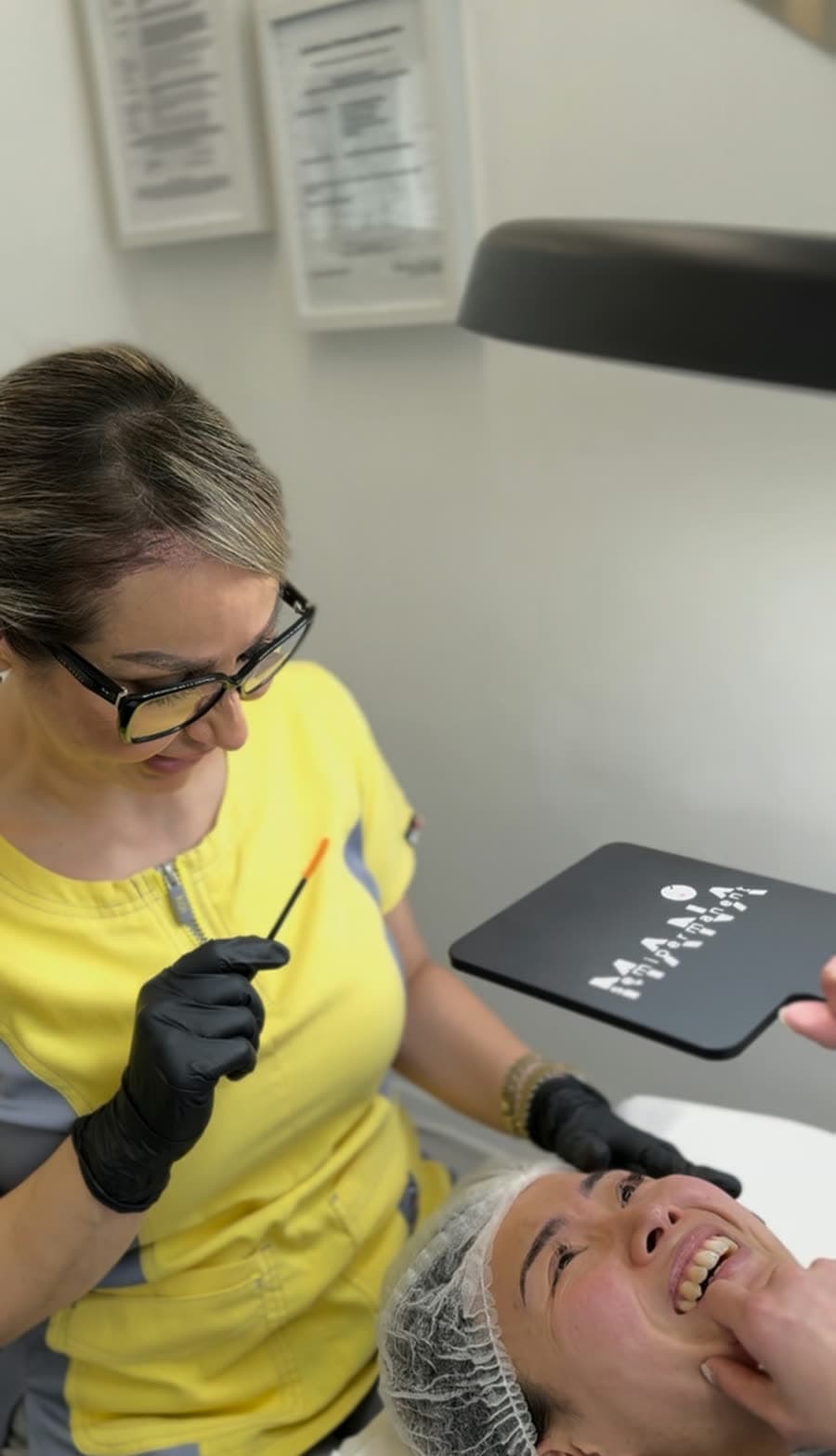 Mana, founder of Mana Semipermanent, carrying out a brow treatment on a client at the studio in Jesmond, Newcastle upon Tyne.
